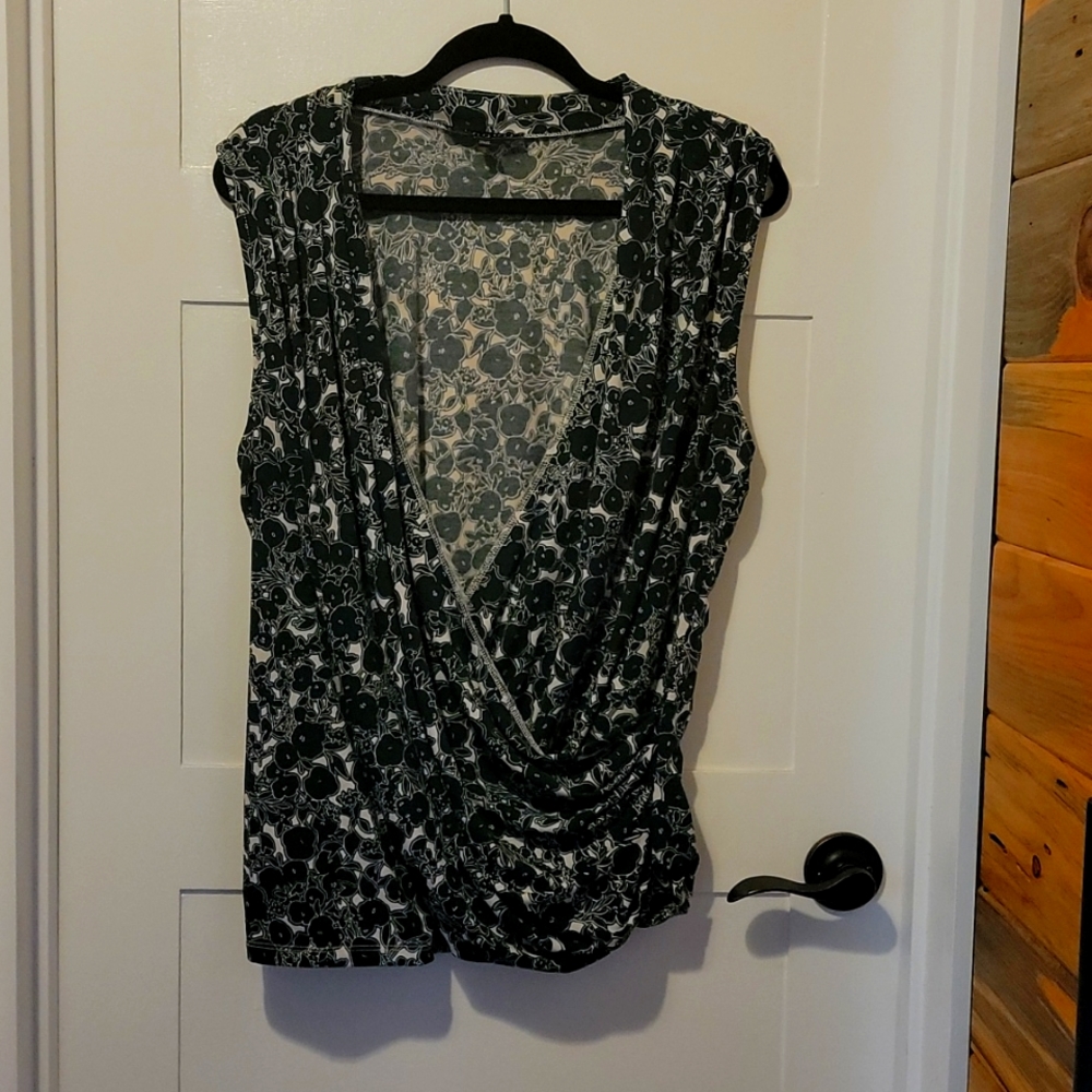 Green sleeveless crossover blouse